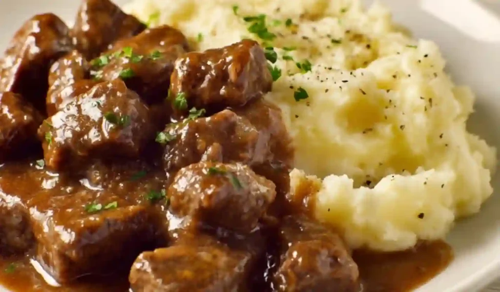 Beef Tips and Gravy Served with Creamy Mashed Potatoes