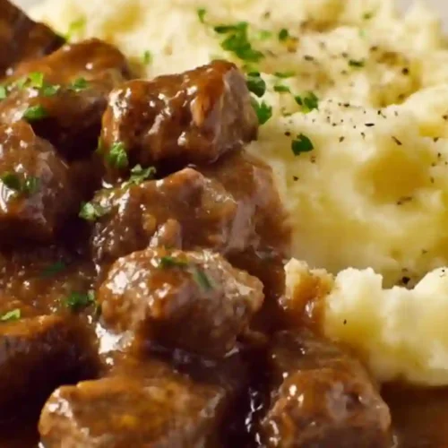Beef Tips and Gravy: A Cozy, Slow-Evening Comfort Dish 3 Beef Tips and Gravy Served with Creamy Mashed Potatoes