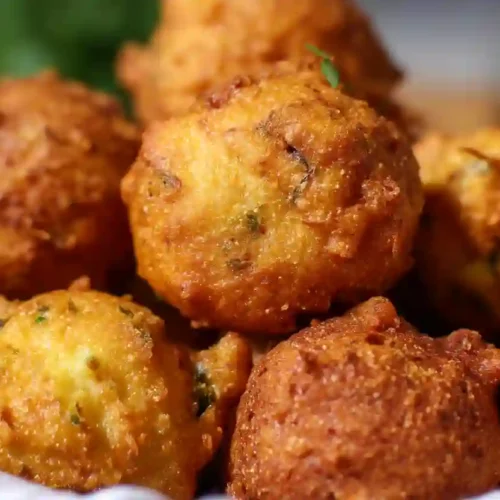 Cozy Southern Hush Puppies Recipe for a Warm, Comforting Family Bite 4 Golden brown southern hush puppies with crispy fried texture in close-up view