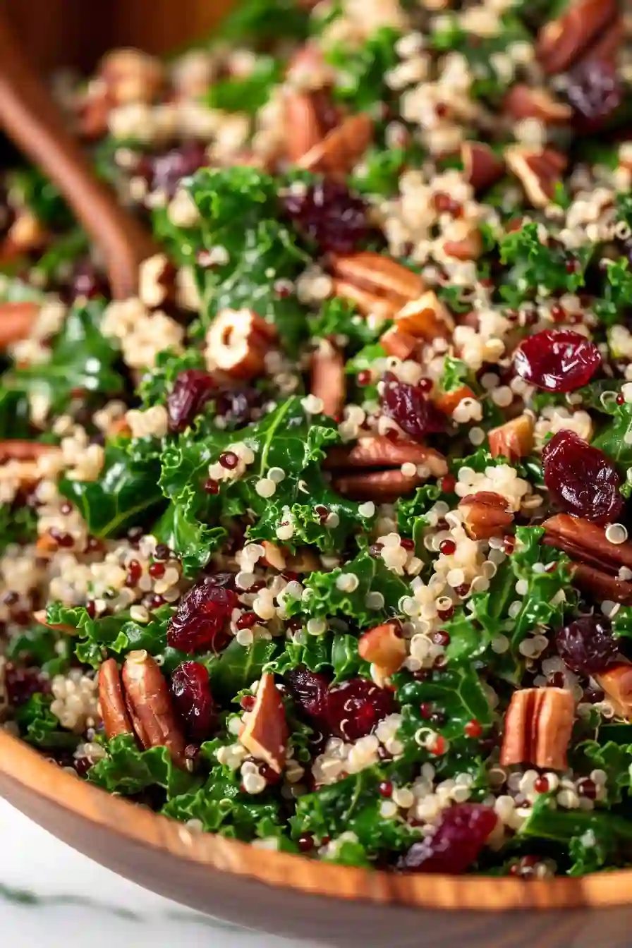 Vertical close-up of kale cranberry quinoa salad with quinoa, pecans, and cranberries