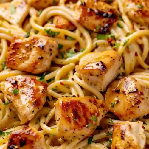 Cowboy butter chicken linguine with golden seared chicken pieces and glossy linguine coated in butter sauce