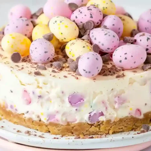 Mini Egg Cheesecake – A Cozy Homemade Easter Dessert Everyone Loves 3 Creamy mini egg cheesecake topped with pastel chocolate mini eggs