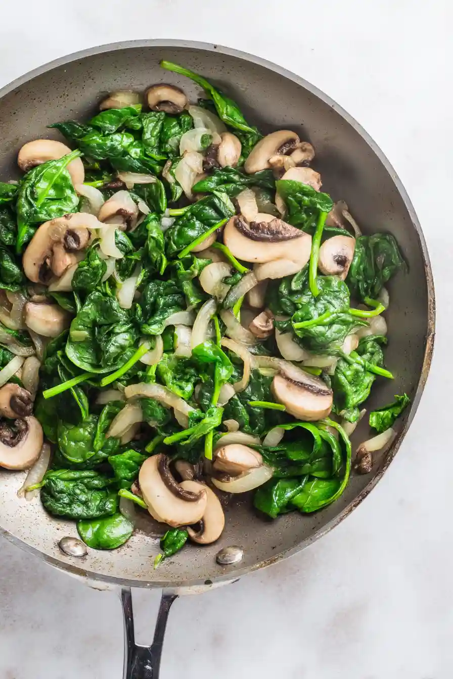 Mushroom Spinach Egg Muffins 5 Cooking the Spinach Until Wilted