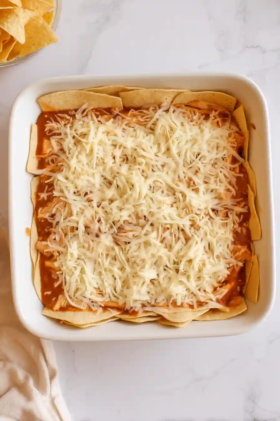 Layer the Tortillas Beans and Chicken
